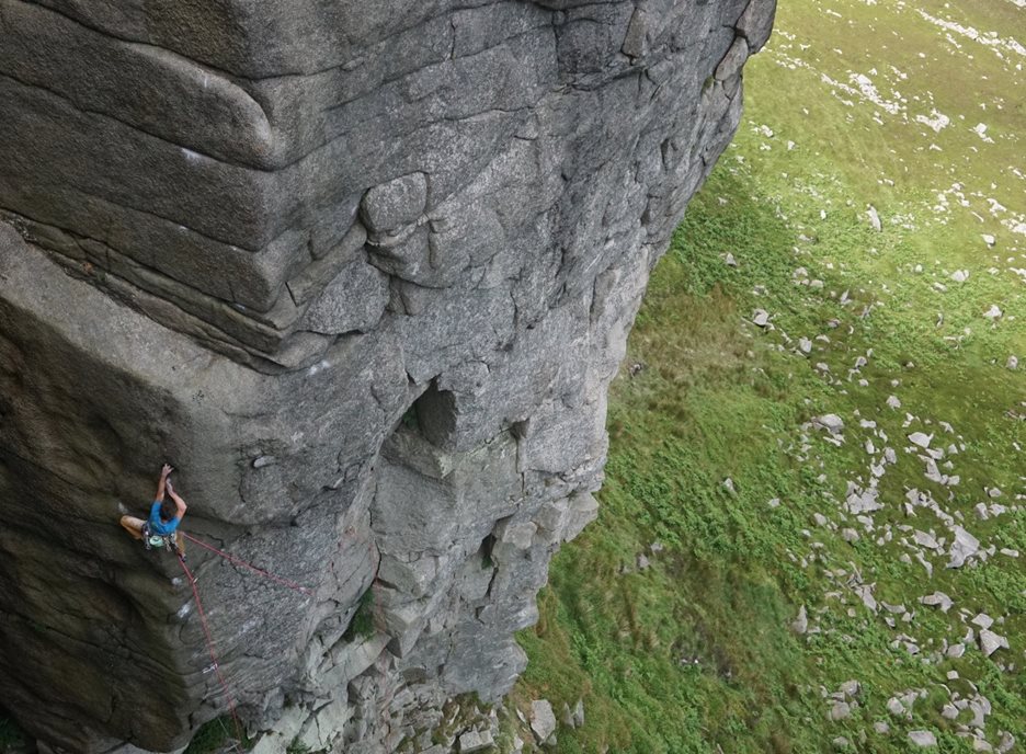 Ricky on the first ascent of Peace Brother E7 6c, Mourne Mountains. © Michelle O'Loughlin