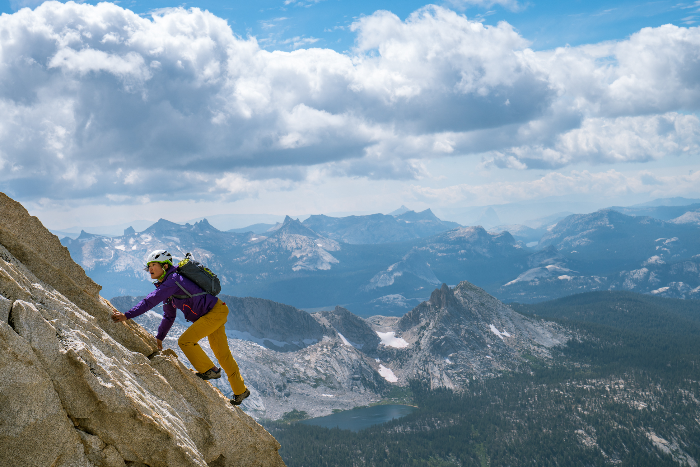 Shelma enjoying the alpine air on Mt Conness in the High Sierra, California. © Drew Smith